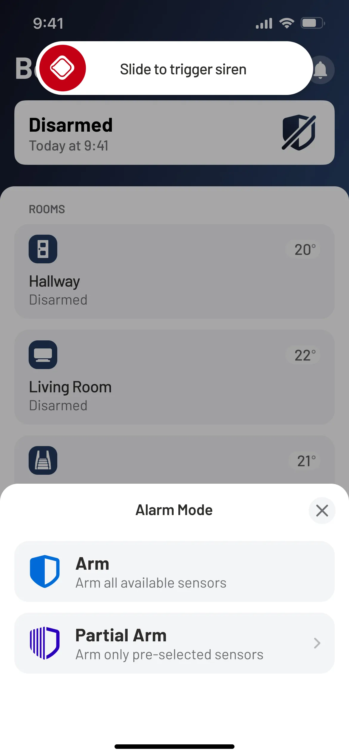 Screenshot of a smartphone displaying the Home Screen of a smart alarm system app. The top of the screen shows a red shield icon with a message 'Slide to trigger siren' indicating a gesture-based control. The alarm system is in 'Disarmed' mode. Below, there are temperature readings next to room names: 'Hallway' at 20 degrees Celsius, 'Living Room' at 22 degrees, both marked as disarmed. At the bottom, two options are shown under 'Alarm Mode': a blue shield icon labeled 'Arm' to arm all available sensors, and a blue-striped shield icon labeled 'Partial Arm' for arming only pre-selected sensors.
